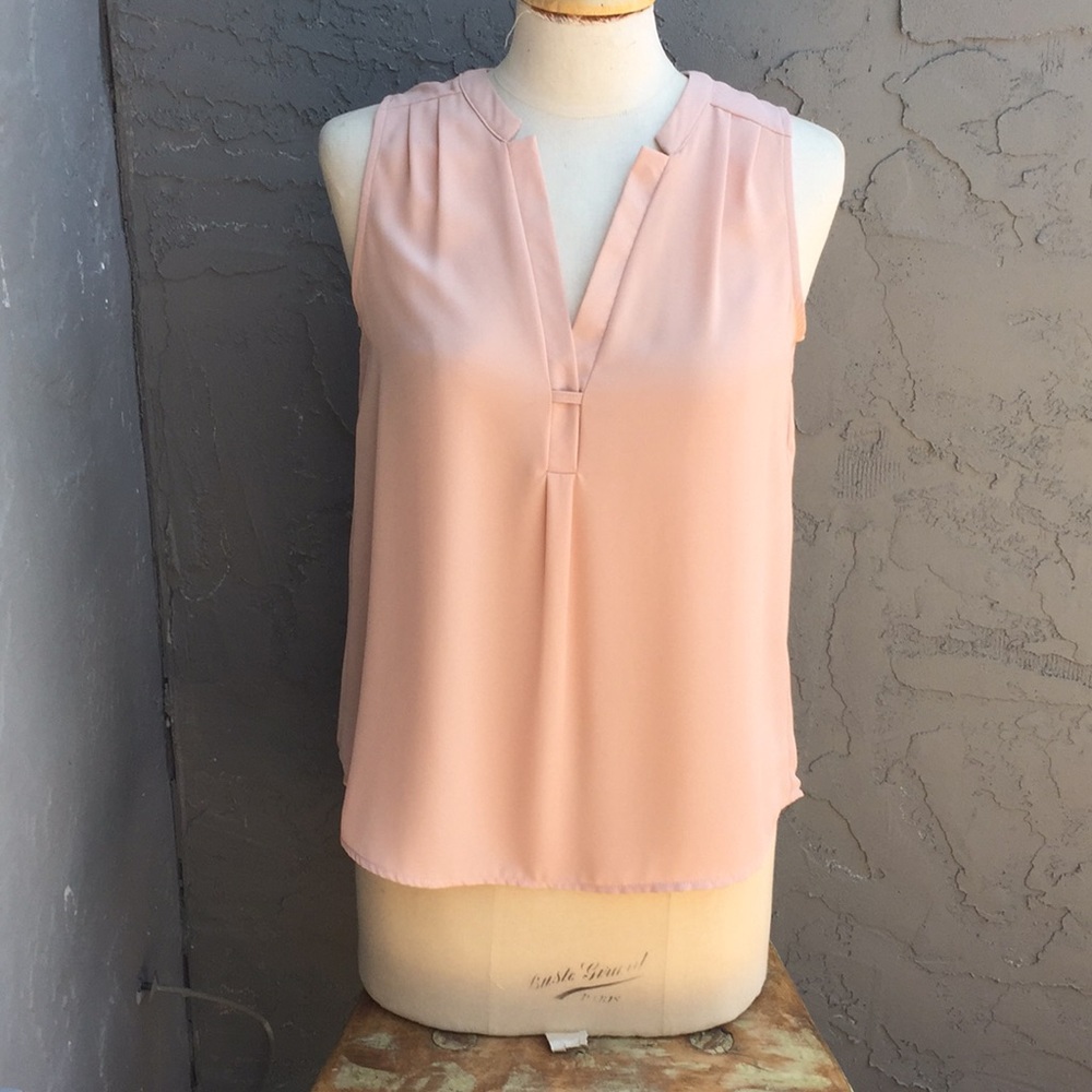 Peach sleeveless blouse